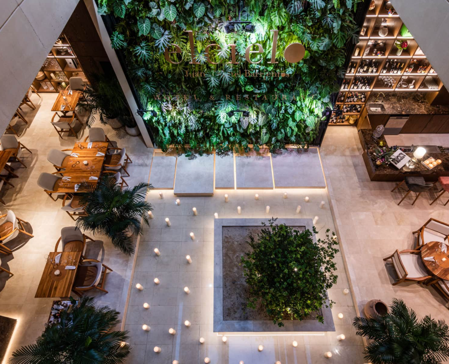 El Cielo Hotel — atrium dining.