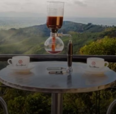 Siphon coffee ritual over the Cauca Valley.